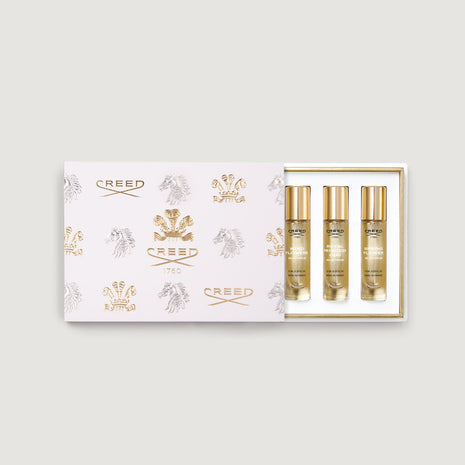 box of five 10ml fragrance vials decorated with gold creed logo and fleur de lis