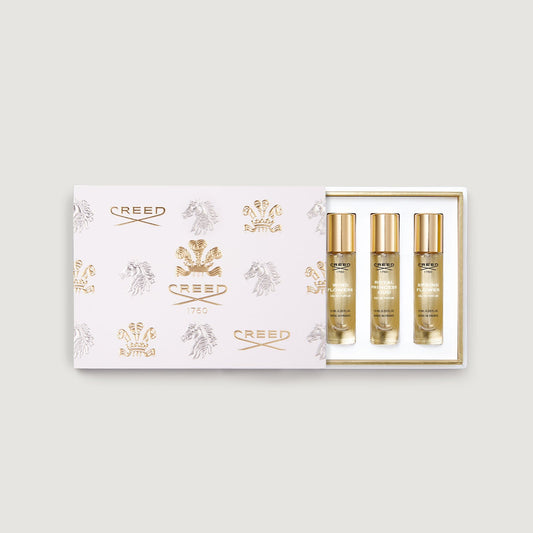 box of five 10ml fragrance vials decorated with gold creed logo and fleur de lis