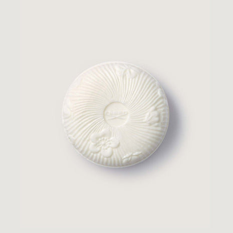 Aventus for Her Soap round bar of soap with patterned imprint