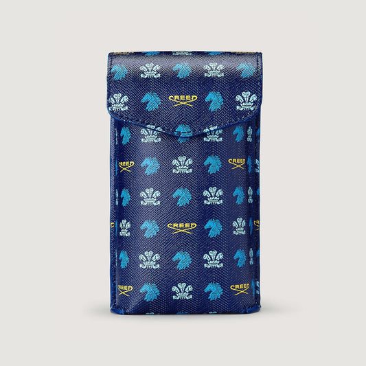 blue leather fragrance sleeve with repeating creed logo
